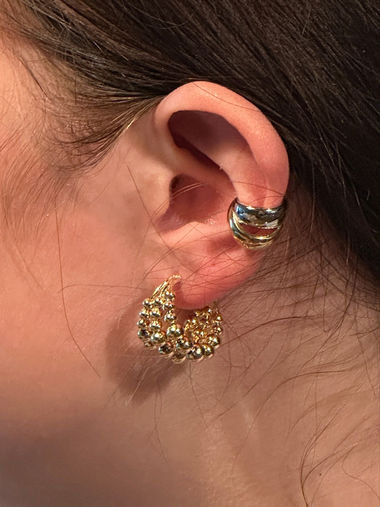 The Noemi Beaded Triple Hoop Earrings, modeled