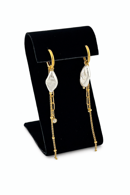 Atelier Charm Hoops shown on black velvet earring display