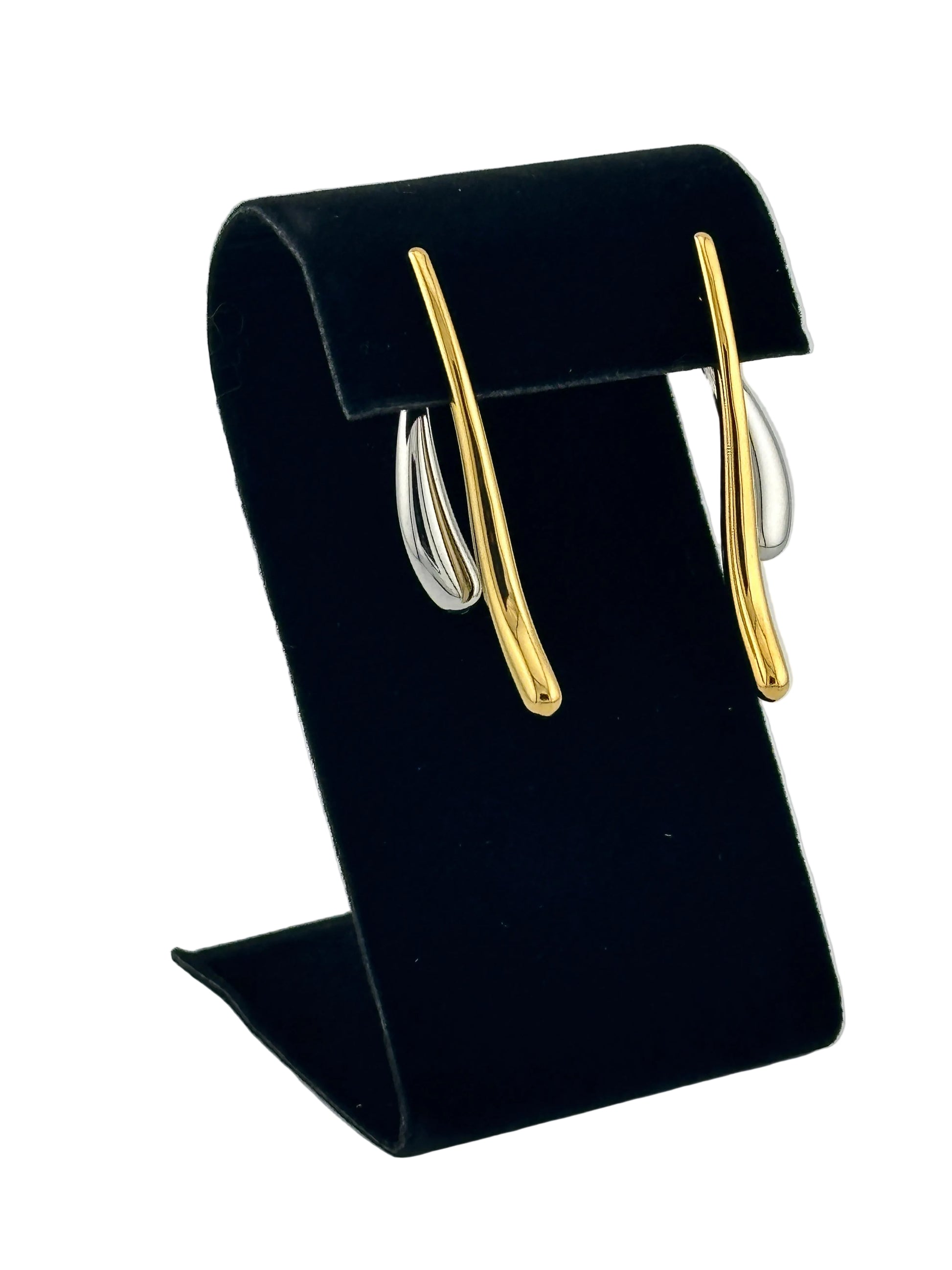 two tone earrings shown on black velvet display