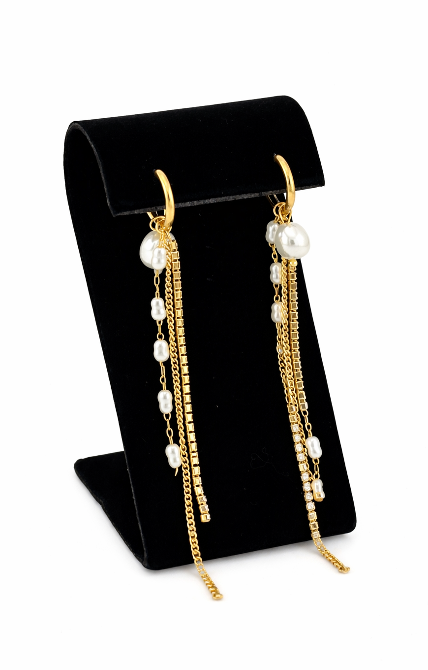 Studio Pearl Hoops shown on black velvet earring display