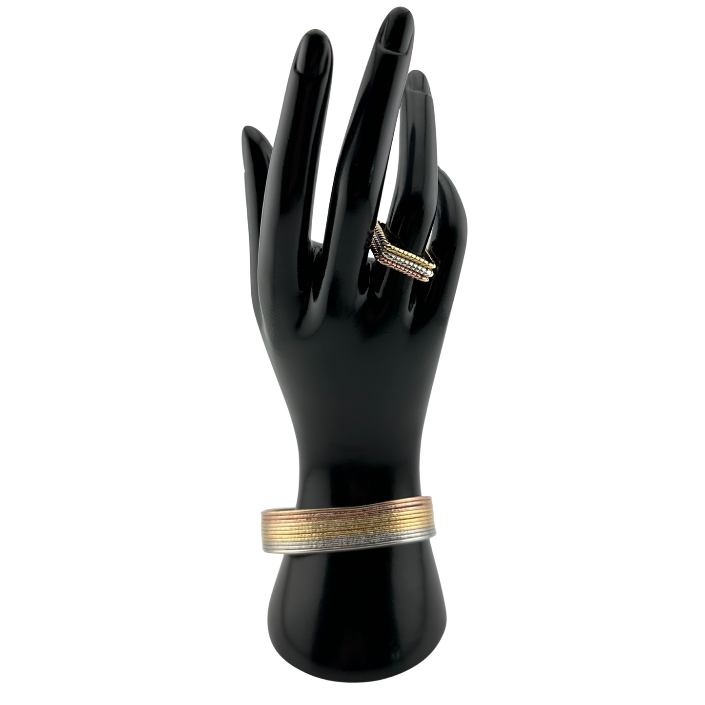 The Verona — Stackable Square Rings, shown in gold, silver, and rose gold color options on mannequin hand display with The Siena Diamond-Cut Tri-Tone Stackable Cuff Bracelet