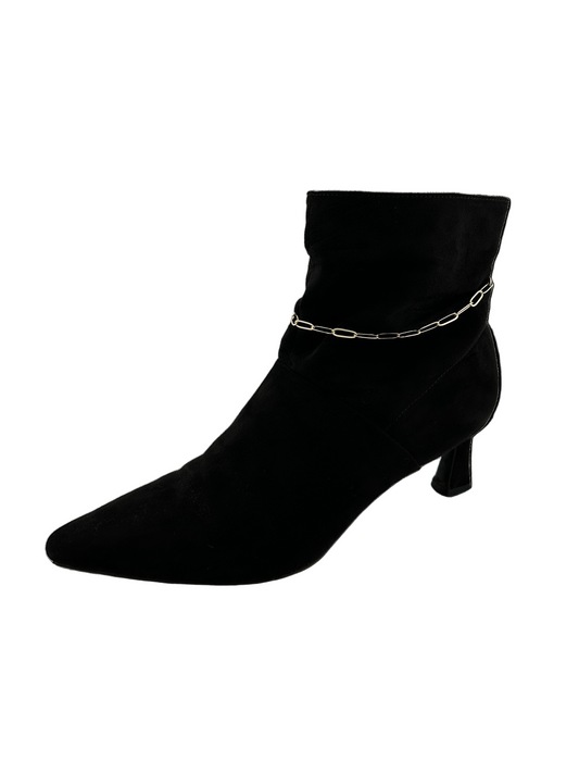 The Aria Paperclip Anklet – 18k gold-filled paperclip anklet on black suede bootie on white background