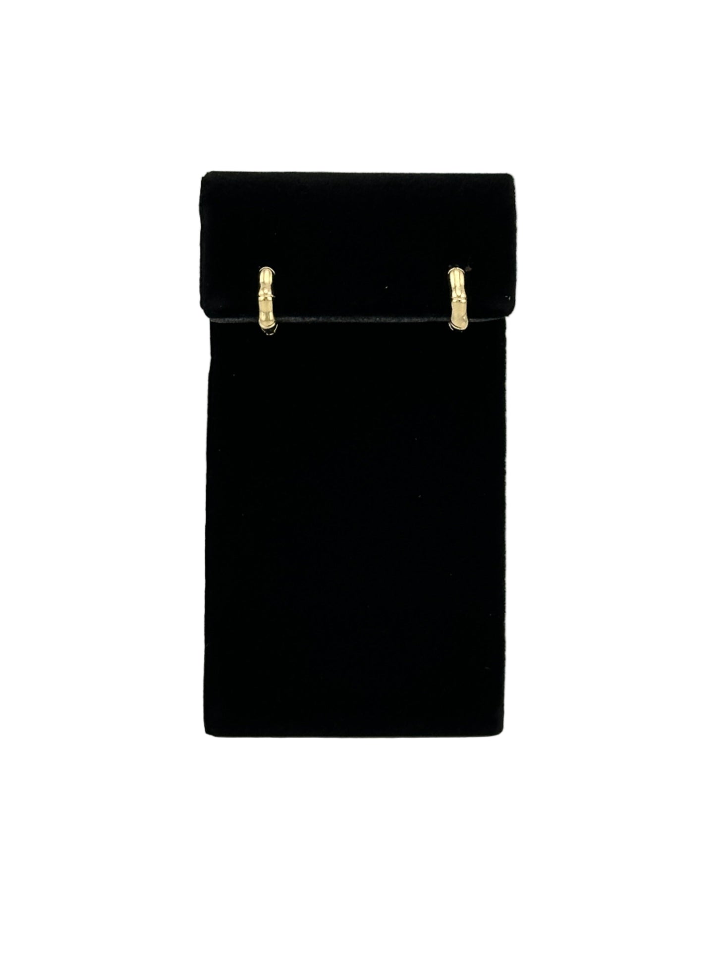 The Berneda Bamboo Clicker Huggie Earrings on black velvet earring stand and white background