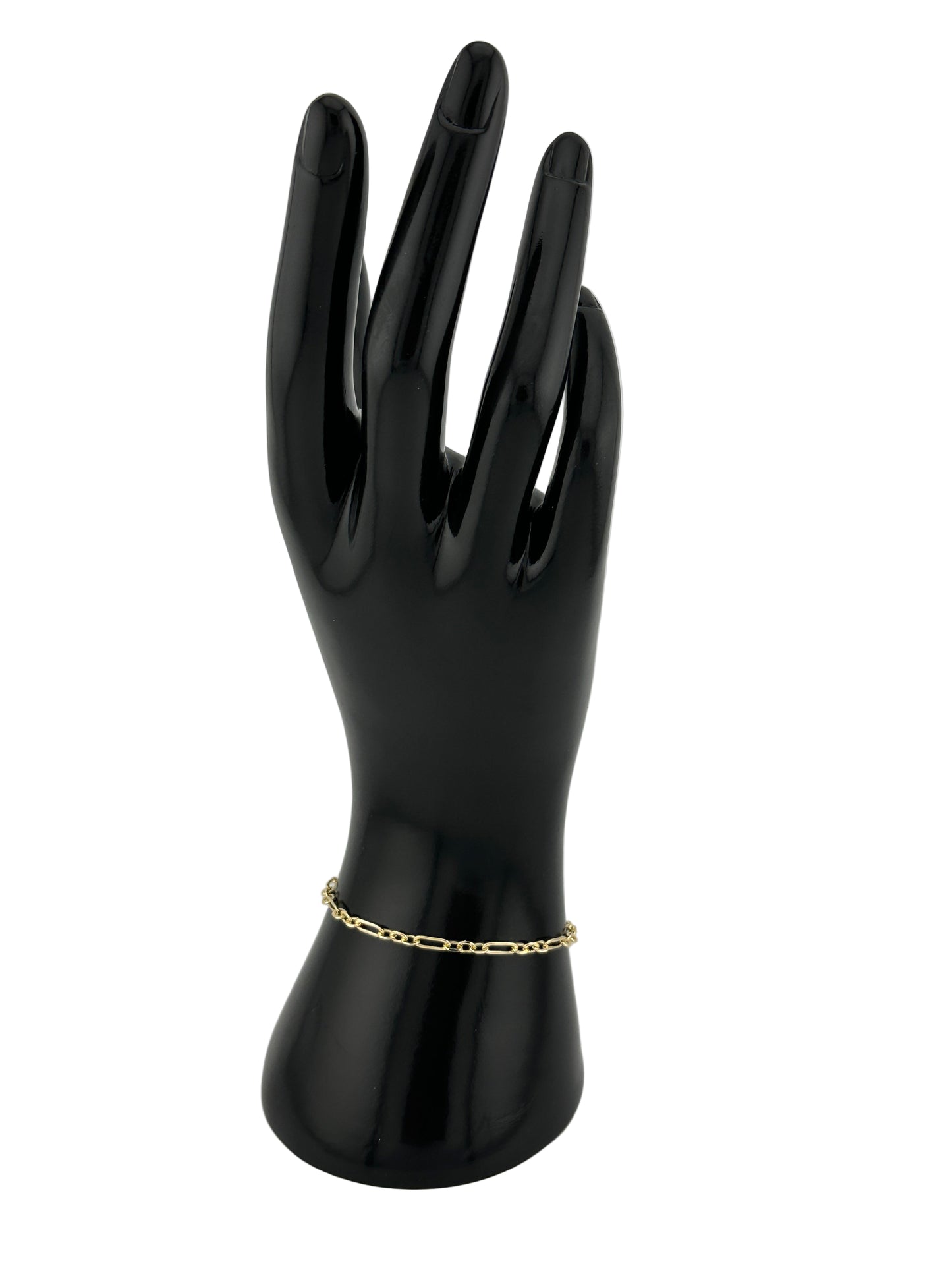 The Catena Bracelet, shown on black hand model and white background