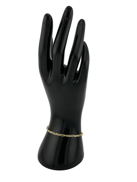 The Catena Bracelet, shown on black hand model and white background