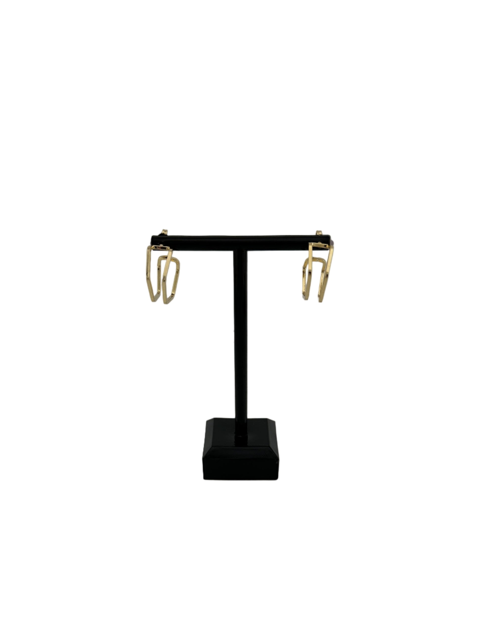 The Gaylen Geometric Hoop Earrings on black earring stand and white background