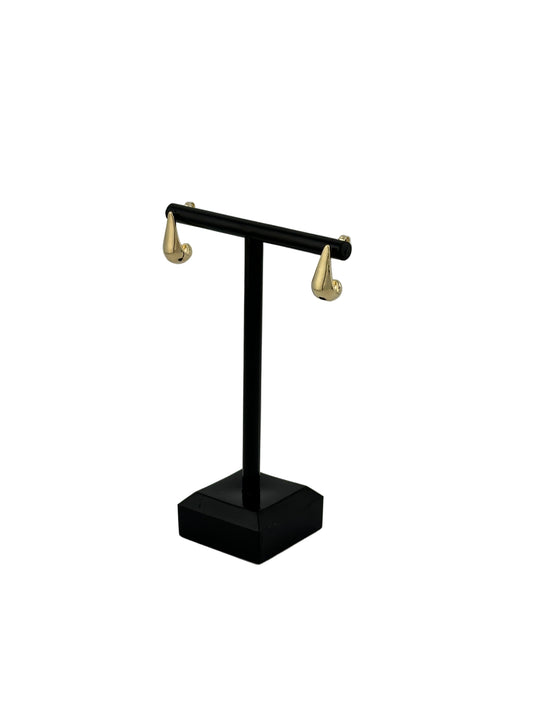 The Kennedy Teardrop Stud Earrings, Side View on black earring stand and white background