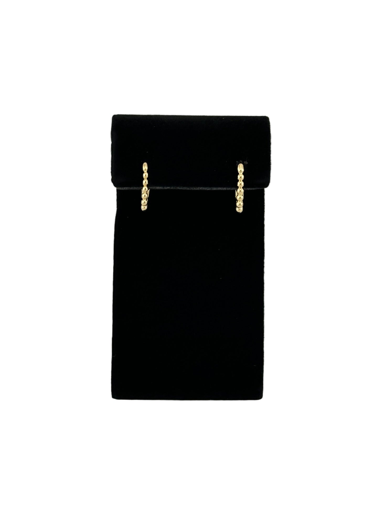 The Noemi Beaded Rectangle Clicker Hoop Earrings on black velvet earring stand and white background
