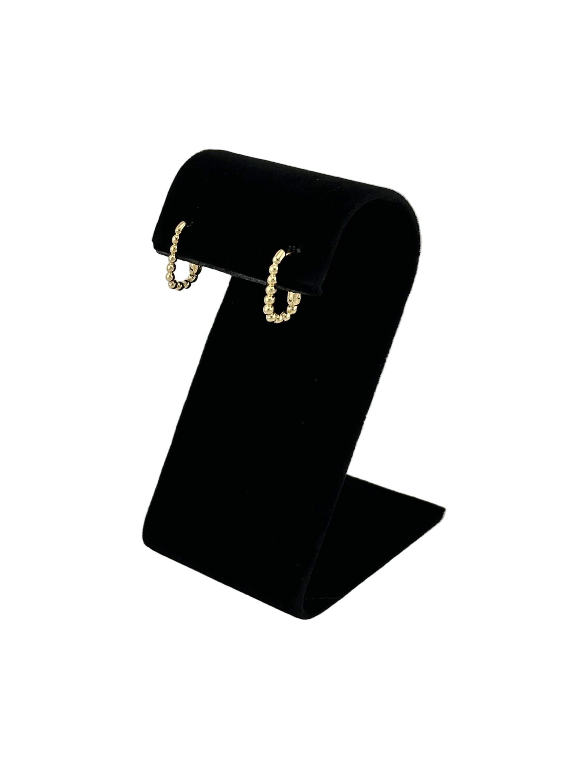 The Noemi Beaded Rectangle Clicker Hoop Earrings, Side View on black velvet earring stand and white background
