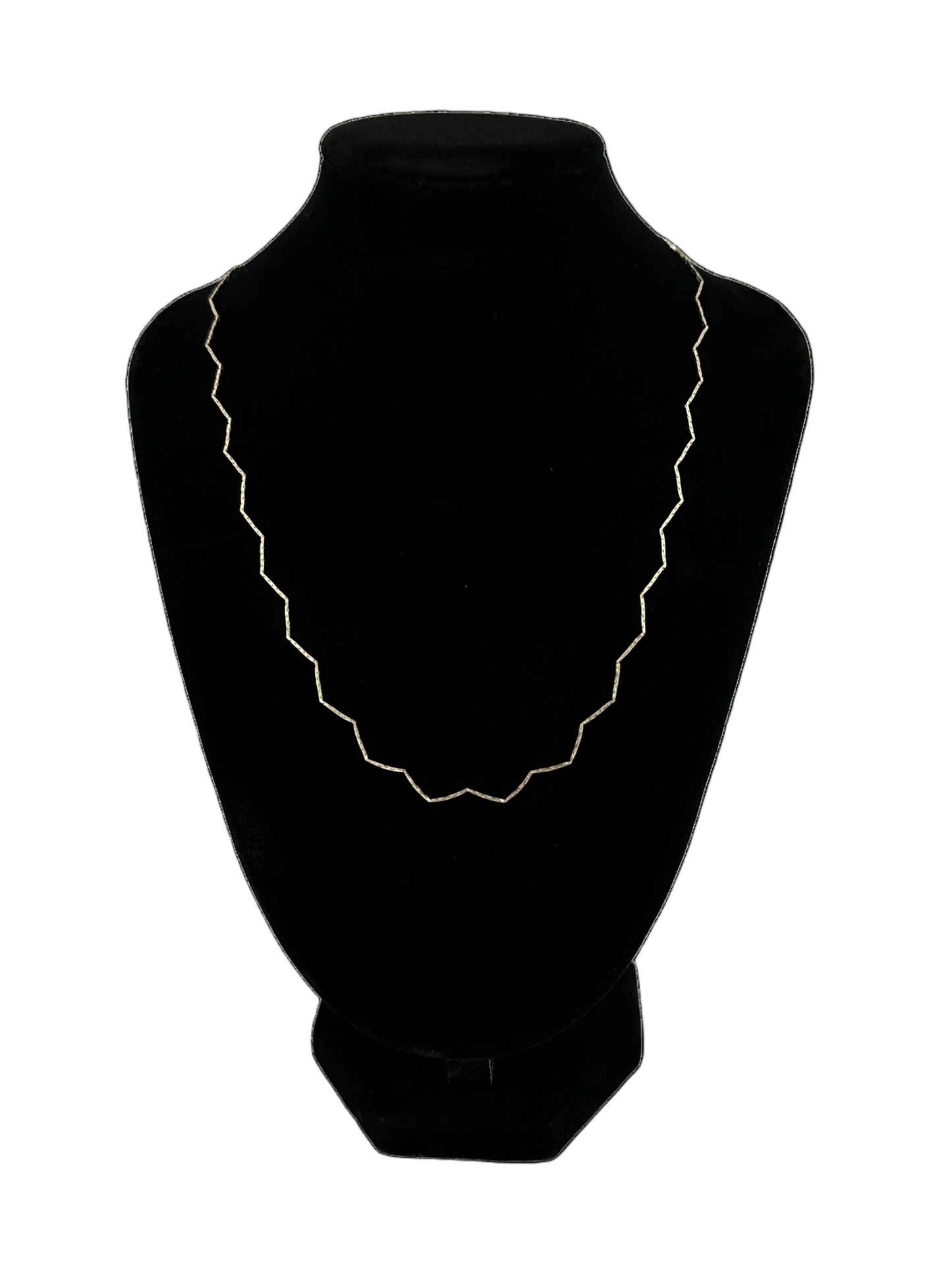 The Nova Zig Zag Choker shown on black velvet neckstand on white background