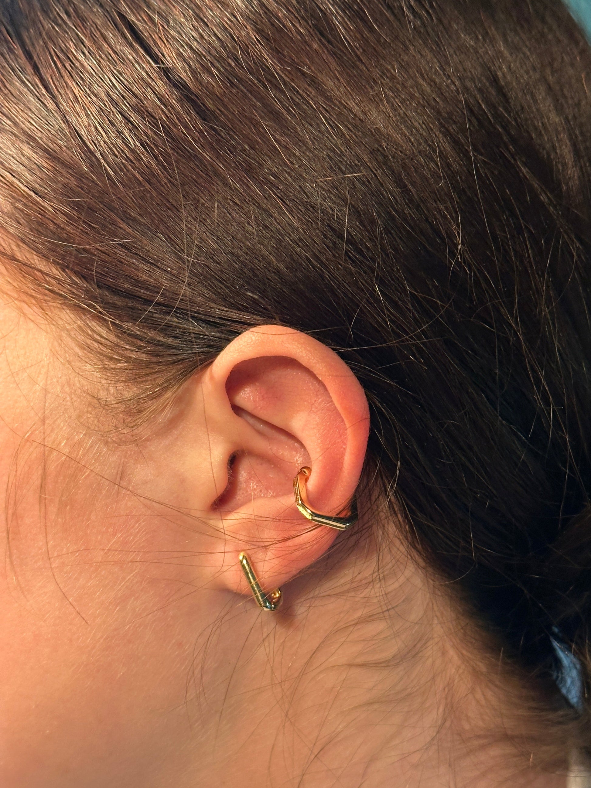 The Sissy Oblong Hoop Earrings, modeled