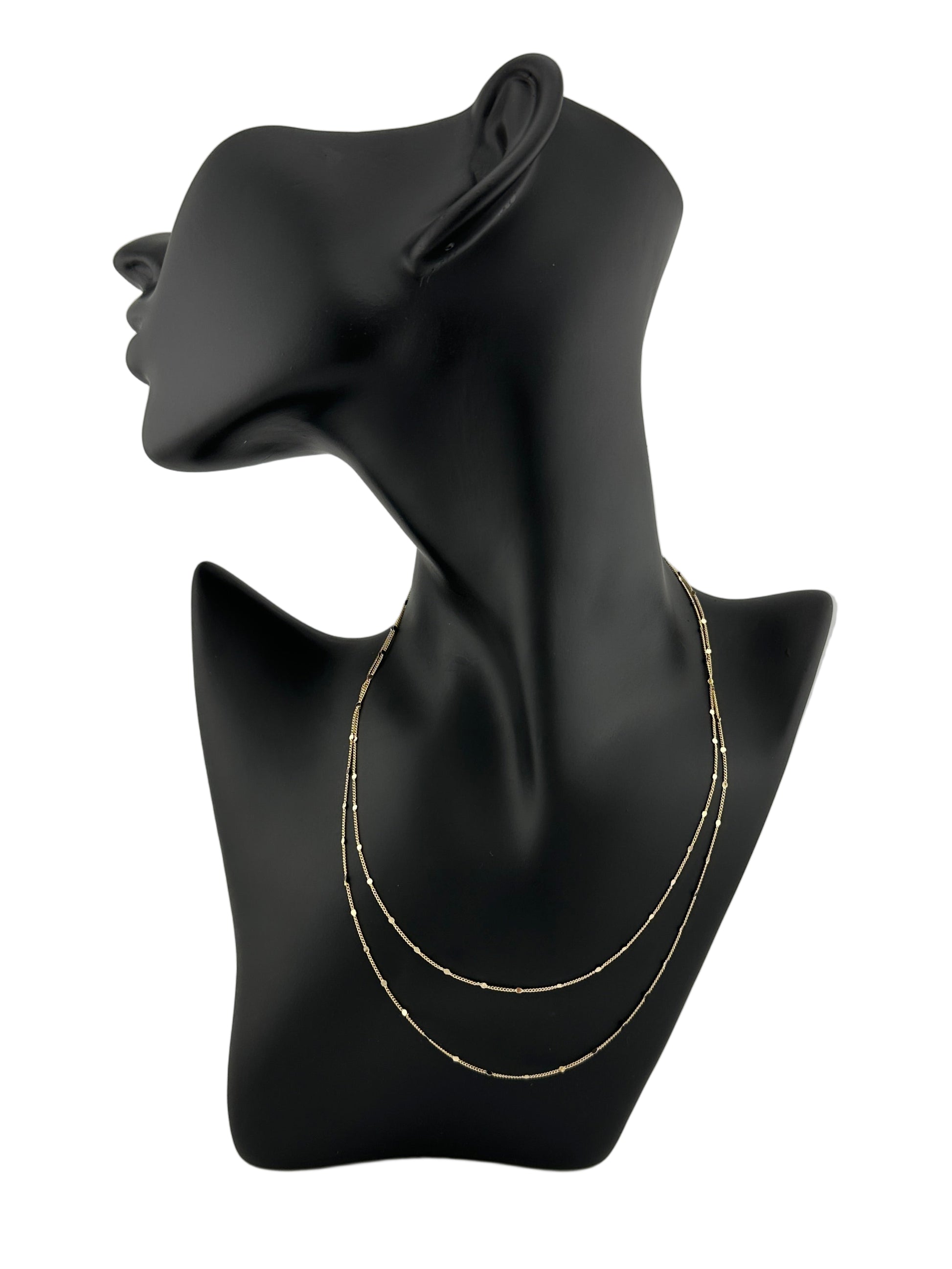 The Stella Chains in 16" and 18" shown on black mannequin display and white background