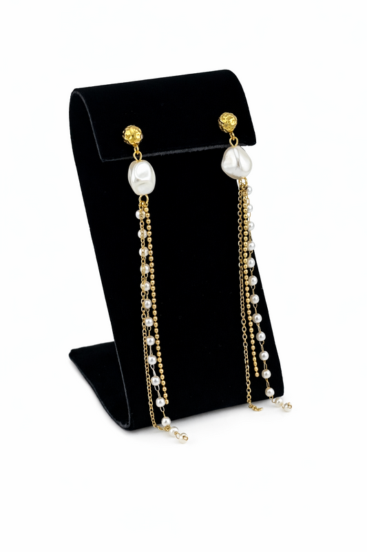 Élan Pearl Drops shown on black velvet earring display